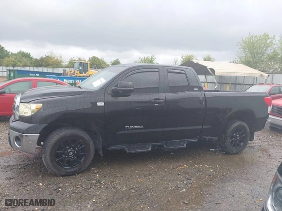 2010 Toyota Tundra 2WD Truck with VIN 5TFRM5F12AX009901, listed as a IAAI auction lot 41980354 with 193,085 mi miles. Bid and sale history available at carsss.com. Image 14.
