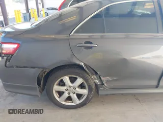 2009 Toyota Camry LE z VIN 4T1BK46K09U592438, wystawiony jako IAAI lot #42078810 z przebiegiem 164 582 mil mil oraz . Historia ofert i sprzedaży dostępna na DreamBid. Obrazek 6.
