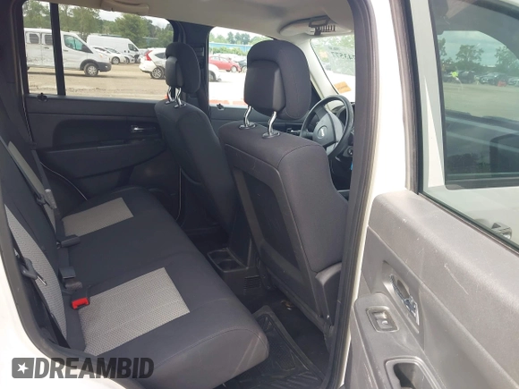 2010 Jeep Liberty Sport z VIN 1J4PN2GKXAW113367, wystawiony jako IAAI lot #42743577 z przebiegiem 118 063 mil mil oraz . Historia ofert i sprzedaży dostępna na DreamBid. Obrazek 8.