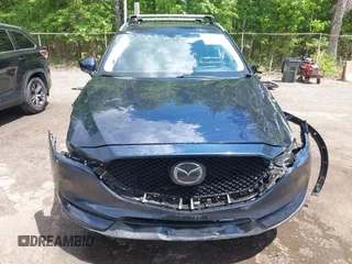 2018 Mazda CX-5 Grand Touring with VIN JM3KFBDM2J0373386, listed as a IAAI auction lot 42200795 with 70,111 mi miles and . Bid and sale history available at DreamBid. Image 13.