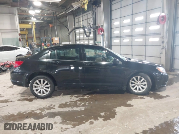 2013 Chrysler 200 Touring with VIN 1C3CCBBB6DN501373, listed as a IAAI auction lot 41587159 with 193,410 mi miles and . Bid and sale history available at DreamBid. Image 13.