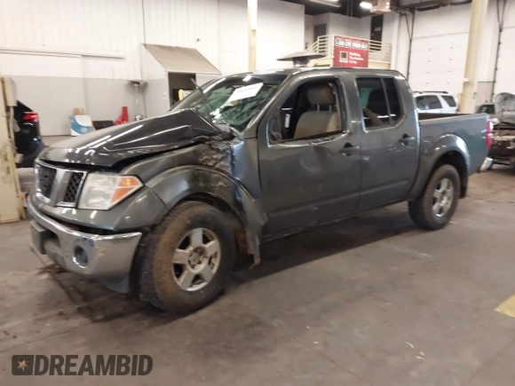 2005 Nissan Frontier LE with VIN 1N6AD07W95C451921, listed as a IAAI auction lot 40952064 with 234,900 mi miles and . Bid and sale history available at DreamBid. Image 2.