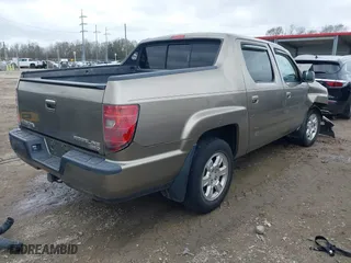 2011 Honda Ridgeline RTS with VIN 5FPYK1F40BB001822, listed as a IAAI auction lot 41448946 with 204,620 mi miles. Bid and sale history available at carsss.com. Image 4.