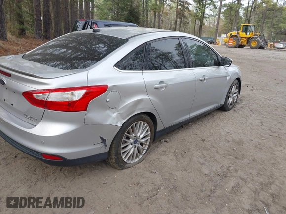 2014 Ford Focus Titanium with VIN 1FADP3J20EL148417, listed as a IAAI auction lot 41954291 with 120,098 mi miles. Bid and sale history available at carsss.com. Image 4.