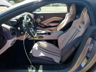 2023 Aston Martin Vantage z VIN SCFSMGBW0PGP08680, wystawiony jako Copart lot #49828114 z przebiegiem Nie podano mil oraz . Historia ofert i sprzedaży dostępna na DreamBid. Obrazek 7.