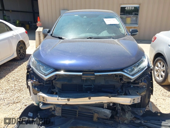 2020 Honda CR-V LX with VIN 2HKRW1H22LH412512, listed as a IAAI auction lot 42107381 with 60,062 mi miles and . Bid and sale history available at DreamBid. Image 13.