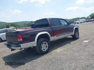 2004 Dodge Dakota SLT with VIN 1D7HG48NX4S649522, listed as a IAAI auction lot 42580132 with 124,037 mi miles and . Bid and sale history available at DreamBid. Image 4.