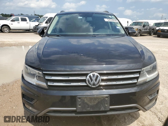 2018 Volkswagen Tiguan S with VIN 3VV1B7AX9JM020833, listed as a Copart auction lot 54539565 with 69,904 mi miles and Salvage title. Bid and sale history available at DreamBid. Image 5.