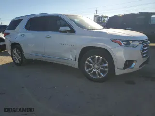 2018 Chevrolet Traverse High Country with VIN 1GNEVKKW0JJ139343, listed as a Copart auction lot 87722385 with 128,143 mi miles and Salvage Title. Bid and sale history available at carsss.com. Image 4.
