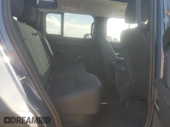 2025 Land Rover Defender S with VIN SALEJ7EXXS2358756, listed as a Copart auction lot 58084165 with 10,919 mi miles and Salvage title. Bid and sale history available at DreamBid. Image 11.