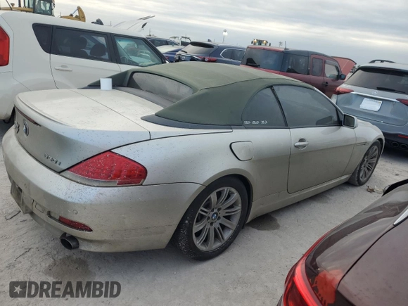 2006 BMW 6 Series 650Ci z VIN WBAEK13466CN72361, wystawiony jako Copart lot #74586414 z przebiegiem Nie podano mil oraz Szkoda całkowita • Salvage title. Historia ofert i sprzedaży dostępna na DreamBid. Obrazek 3.