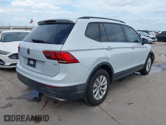 2018 Volkswagen Tiguan S with VIN 3VV1B7AX0JM092116, listed as a IAAI auction lot 42388339 with 103,412 mi miles and . Bid and sale history available at DreamBid. Image 4.