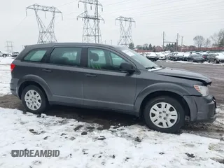 2014 Dodge Journey SE with VIN 3C4PDCAB0ET182376, listed as a IAAI auction lot 41569006 with 106,024 mi miles and . Bid and sale history available at DreamBid. Image 1.