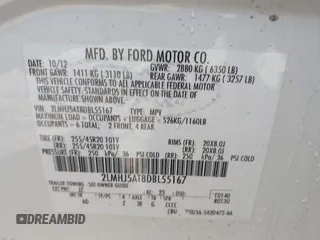 2013 Lincoln MKT EcoBoost with VIN 2LMHJ5AT8DBL55167, listed as a IAAI auction lot 41894396 with 121,114 mi miles. Bid and sale history available at carsss.com. Image 9.