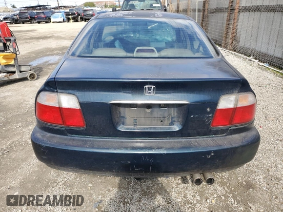 1997 Honda Accord EX with VIN 1HGCD5668VA262569, listed as a Copart auction lot 44713835 with 261,346 mi miles and Salvage Title. Bid and sale history available at DreamBid. Image 6.