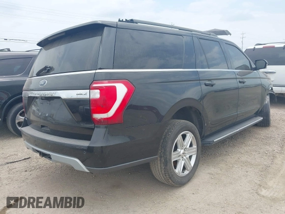 2019 Ford Expedition Max XLT with VIN 1FMJK1HTXKEA07297, listed as a IAAI auction lot 42431260 with 220,617 mi miles and . Bid and sale history available at DreamBid. Image 4.