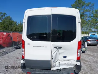 2016 Ford Transit Cargo with VIN 1FTYE1CM4GKB53505, listed as a IAAI auction lot 41958440 with 52,125 mi miles and . Bid and sale history available at carsss.com. Image 6.