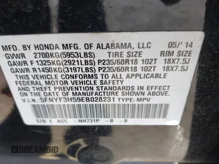 2014 Honda Pilot EX-L with VIN 5FNYF3H59EB028231, listed as a IAAI auction lot 41335724 with 112,614 mi miles. Bid and sale history available at carsss.com. Image 9.