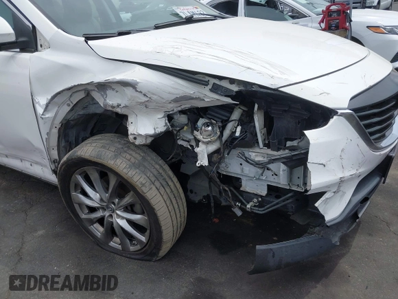 2015 Mazda CX-9 Grand Touring z VIN JM3TB2DV9F0458340, wystawiony jako IAAI lot #42021843 z przebiegiem 145 929 mil mil oraz . Historia ofert i sprzedaży dostępna na DreamBid. Obrazek 6.