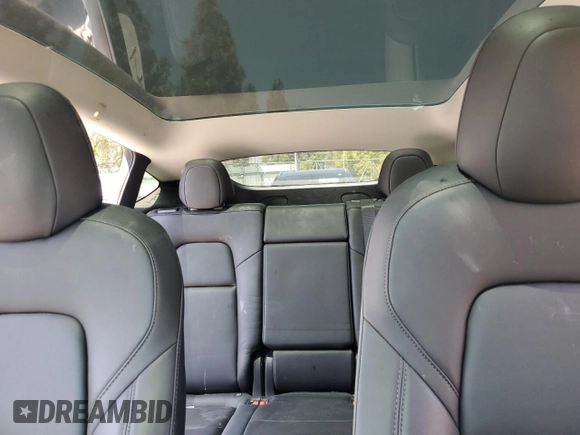 2022 Tesla Model Y Performance z VIN 7SAYGDEF2NF443037, wystawiony jako Copart lot #56870145 z przebiegiem 51 897 mil mil oraz Szkoda całkowita • Salvage title. Historia ofert i sprzedaży dostępna na DreamBid. Obrazek 10.