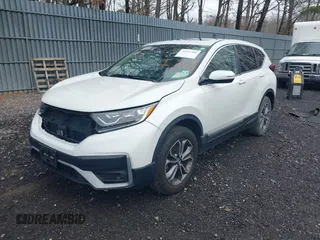 2021 Honda CR-V EX with VIN 2HKRW2H55MH636763, listed as a IAAI auction lot 41931501 with 116,061 mi miles. Bid and sale history available at carsss.com. Image 2.