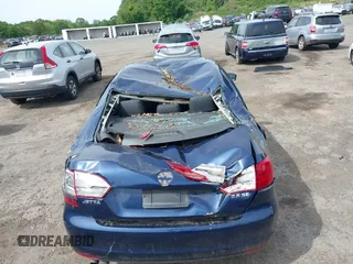 2013 Volkswagen Jetta SE z VIN 3VWDP7AJ0DM292598, wystawiony jako IAAI lot #42360798 z przebiegiem 169 885 mil mil oraz . Historia ofert i sprzedaży dostępna na DreamBid. Obrazek 6.