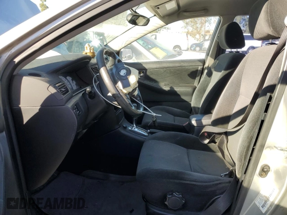 2003 Toyota Corolla CE with VIN 1NXBR32E13Z155142, listed as a Copart auction lot 79714184 with 299,999 mi miles and Salvage Title. Bid and sale history available at DreamBid. Image 7.