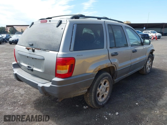 2001 Jeep Grand Cherokee Laredo with VIN 1J4GW48S11C503427, listed as a IAAI auction lot 40004360 with 232,712 mi miles and . Bid and sale history available at DreamBid. Image 4.