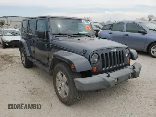 2007 Jeep Wrangler Unlimited Sahara z VIN 1J4GB59147L165439, wystawiony jako Copart lot #50794065 z przebiegiem 255 385 mil mil oraz Szkoda całkowita • Salvage title. Historia ofert i sprzedaży dostępna na DreamBid. Obrazek 4.