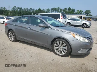 2013 Hyundai Sonata SE z VIN 5NPEC4AC2DH557370, wystawiony jako Copart lot #59120895 z przebiegiem 180 932 mil mil oraz Szkoda całkowita • Salvage title. Historia ofert i sprzedaży dostępna na DreamBid. Obrazek 4.
