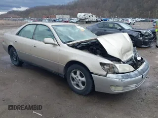 1997 Lexus ES 300 Luxury Sport Sdn with VIN JT8BF22G9V0040046, listed as a IAAI auction lot 41825311 with 316,395 mi miles. Bid and sale history available at carsss.com. Image 1.
