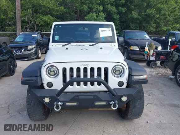 2016 Jeep Wrangler Unlimited Sport RHD z VIN 1C4BJWKG3GL293694, wystawiony jako IAAI lot #42569773 z przebiegiem 140 243 mil mil oraz . Historia ofert i sprzedaży dostępna na DreamBid. Obrazek 12.