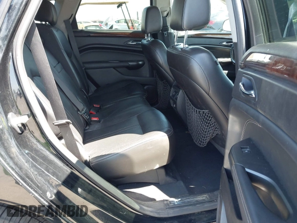 2012 Cadillac SRX Performance Collection z VIN 3GYFNBE30CS659973, wystawiony jako IAAI lot #42555119 z przebiegiem 141 842 mil mil oraz . Historia ofert i sprzedaży dostępna na DreamBid. Obrazek 8.