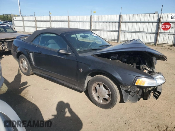 2000 Ford Mustang z VIN 1FAFP4442YF105843, wystawiony jako Copart lot #51977385 z przebiegiem 176 981 mil mil oraz Szkoda całkowita • Salvage title. Historia ofert i sprzedaży dostępna na DreamBid. Obrazek 4.