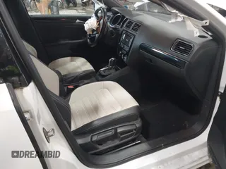 2015 Volkswagen Jetta SE z VIN 3VWD17AJ2FM427343, wystawiony jako IAAI lot #42520443 z przebiegiem 60 409 mil mil oraz . Historia ofert i sprzedaży dostępna na DreamBid. Obrazek 5.