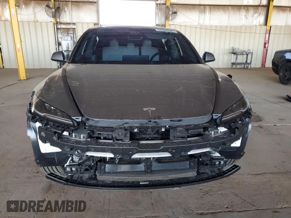 2025 Tesla Model 3 Long Range z VIN 5YJ3E1EB6SF935588, wystawiony jako Copart lot #54360605 z przebiegiem Nie podano mil oraz Szkoda całkowita • Salvage title. Historia ofert i sprzedaży dostępna na DreamBid. Obrazek 5.