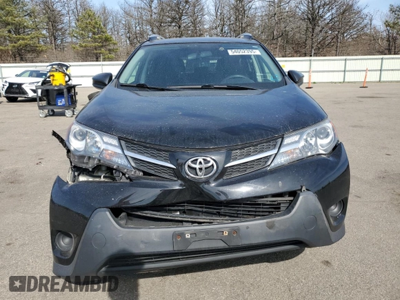 2015 Toyota RAV4 LE with VIN 2T3BFREV0FW296593, listed as a Copart auction lot 54052395 with 106,702 mi miles and Salvage title. Bid and sale history available at DreamBid. Image 5.
