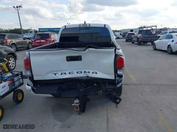 2023 Toyota Tacoma 4WD SR with VIN 3TMCZ5AN9PM566739, listed as a IAAI auction lot 41513763 with 16,708 mi miles. Bid and sale history available at carsss.com. Image 17.