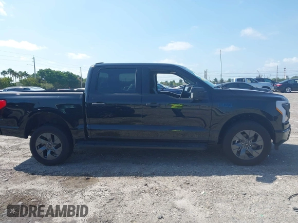 2024 Ford F-150 Lightning XLT with VIN 1FTVW3LK8RWG20320, listed as a IAAI auction lot 41960103 with Not provided miles and . Bid and sale history available at DreamBid. Image 12.