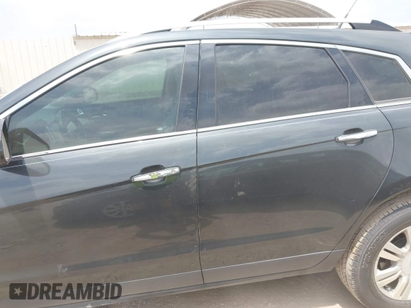 2014 Cadillac SRX Luxury Collection with VIN 3GYFNBE33ES599058, listed as a IAAI auction lot 42080556 with 128,917 mi miles. Bid and sale history available at carsss.com. Image 14.