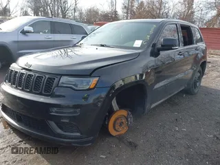 2018 Jeep Grand Cherokee High Altitude with VIN 1C4RJFCT9JC325436, listed as a IAAI auction lot 41189143 with 116,785 mi miles. Bid and sale history available at carsss.com. Image 2.