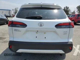 2024 Toyota Corolla Cross XLE with VIN 7MUDAABG4RV105641, listed as a Copart auction lot 58950855 with 5,805 mi miles and Salvage title. Bid and sale history available at DreamBid. Image 6.
