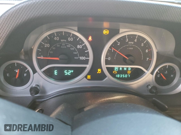 2010 Jeep Wrangler Rubicon with VIN 1J4BA6D17AL132002, listed as a Copart auction lot 83869124 with 183,507 mi miles and Salvage title. Bid and sale history available at DreamBid. Image 9.