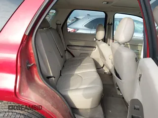 2008 Mercury Mariner with VIN 4M2CU81178KJ15616, listed as a IAAI auction lot 42166858 with 187,444 mi miles and . Bid and sale history available at DreamBid. Image 8.