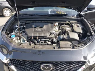 2024 Mazda CX-30 2.5 S with VIN 3MVDMBAM5RM687164, listed as a IAAI auction lot 41465592 with 4,705 mi miles. Bid and sale history available at carsss.com. Image 10.
