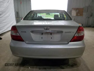 2003 Toyota Camry LE with VIN 4T1BE32K33U710903, listed as a Copart auction lot 56976585 with 157,444 mi miles and Clean Title. Bid and sale history available at DreamBid. Image 6.