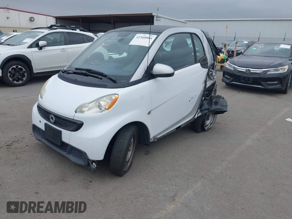 2013 Smart fortwo Pure with VIN WMEEJ3BA5DK625404, listed as a IAAI auction lot 42368884 with Not provided miles and . Bid and sale history available at DreamBid. Image 17.