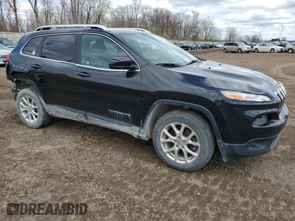 2014 Jeep Cherokee Latitude with VIN 1C4PJMCS3EW124574, listed as a Copart auction lot 53657635 with 164,572 mi miles and Clean Title. Bid and sale history available at carsss.com. Image 4.