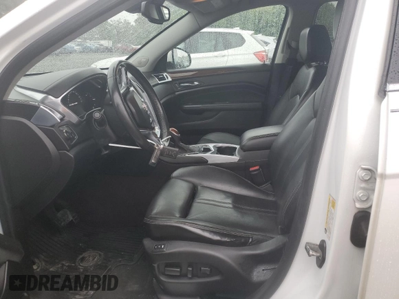 2013 Cadillac SRX Performance Collection with VIN 3GYFNHE34DS597871, listed as a Copart auction lot 56470795 with 208,504 mi miles and Salvage title. Bid and sale history available at DreamBid. Image 7.