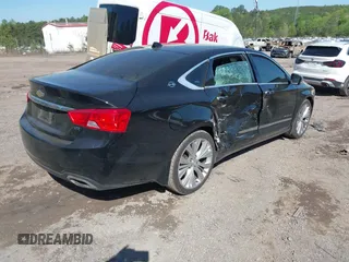 2014 Chevrolet Impala LTZ with VIN 1G1155S30EU121744, listed as a IAAI auction lot 41990517 with 140,573 mi miles and . Bid and sale history available at DreamBid. Image 4.